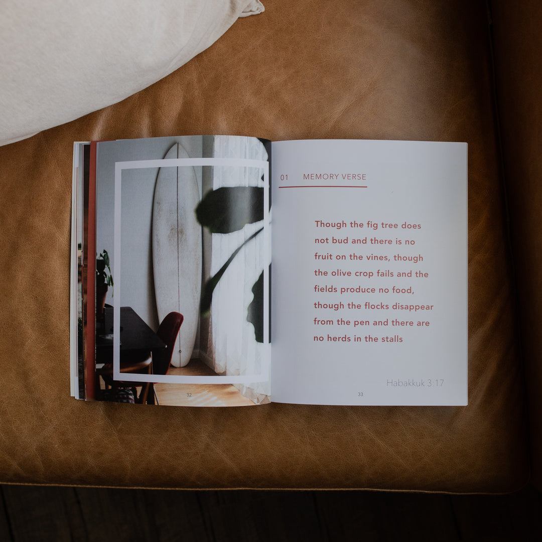 Even If Study opened to the memory verse page on a leather couch