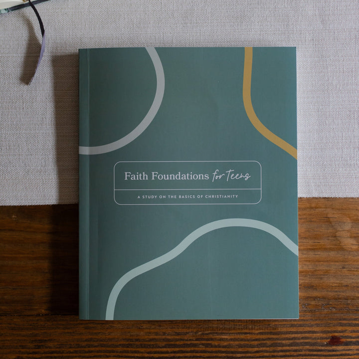 Faith Foundations for Teens Bible study laying on a table 