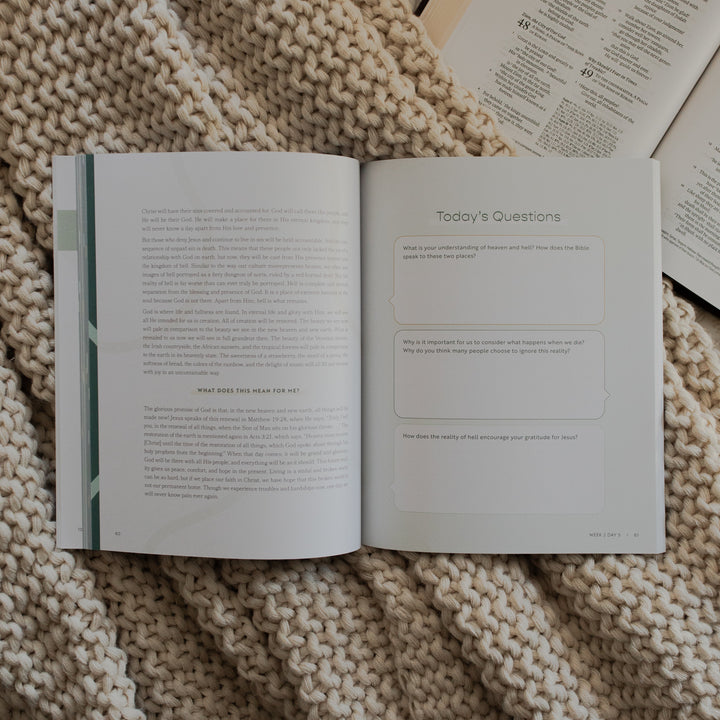 Faith Foundations for Teens study opened to the today questions page on a knitted blanket on an open bible