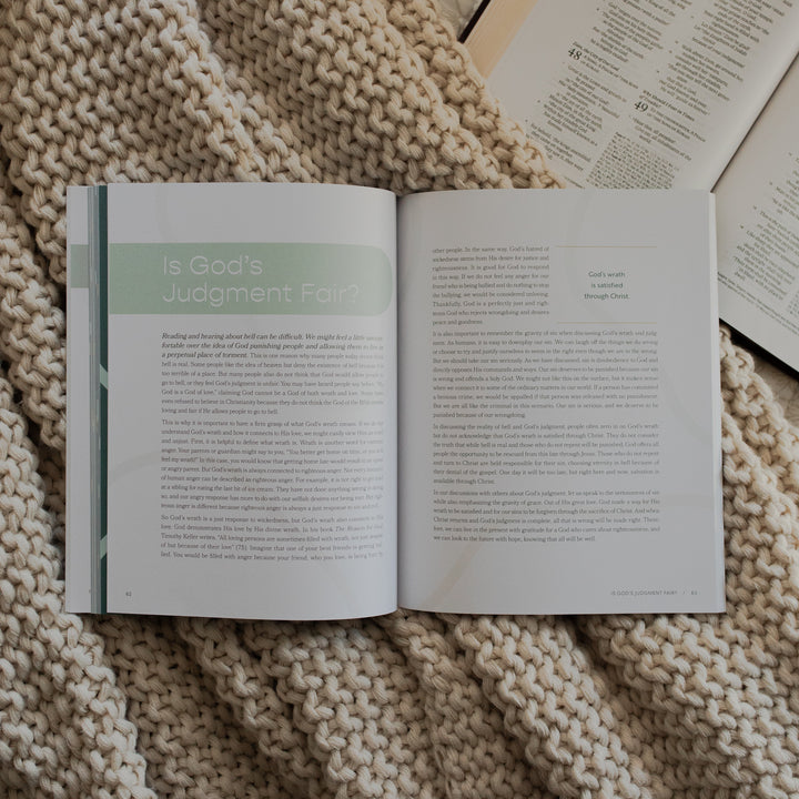 Faith Foundations for Teens study opened to the Is God's Judgement Fair page on a knitted blanket on an open bible