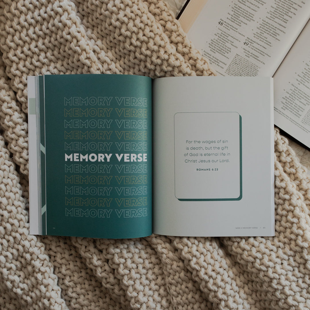 Faith Foundations for Teens study opened to the Memory Verse page on a knitted blanket on an open bible