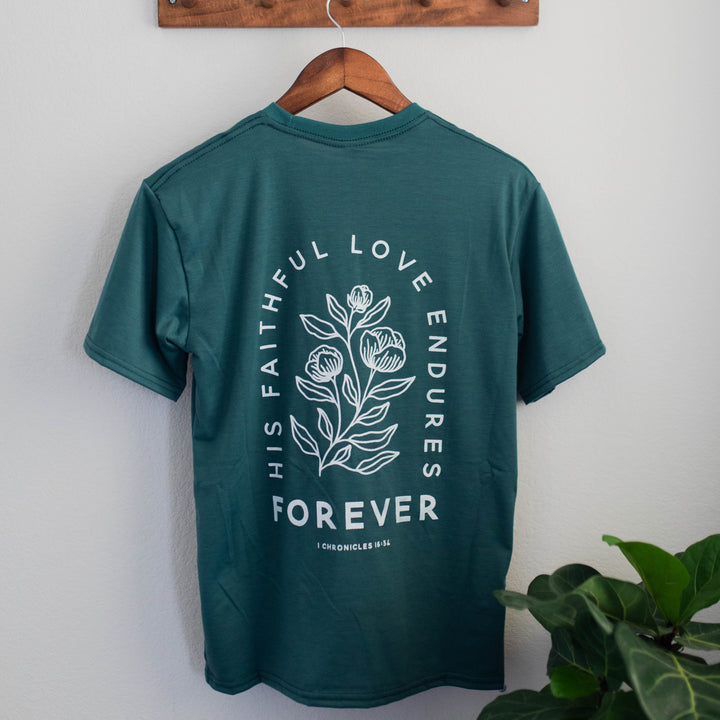 green tee shirt with his faithful love endures forever on back