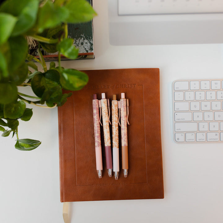 Floral lace pens on a devotional 