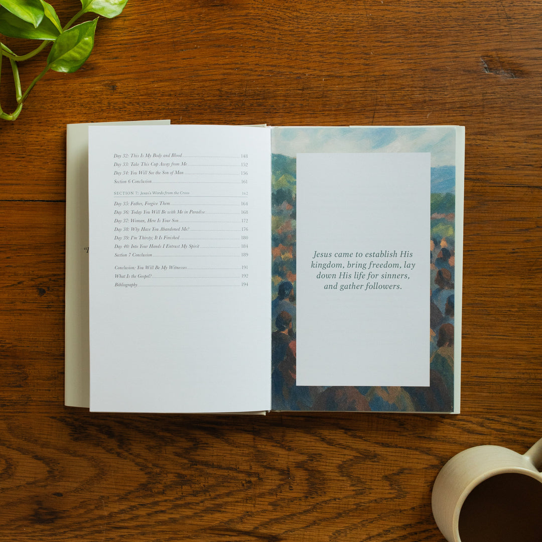 The Forty Sayings of Jesus book on a wooden table opened to the end of the table of contents page