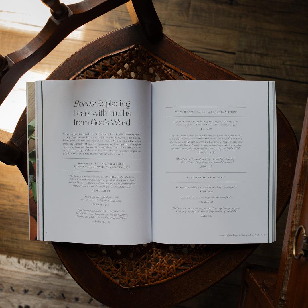 Fresh Start Bible study opened to the Bonus: Replacing fears with truths from God's word page on a woven chair