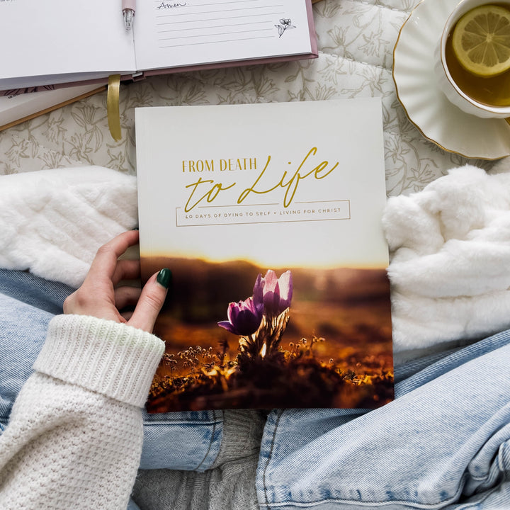 woman holding lent bible studies for protestants and catholics