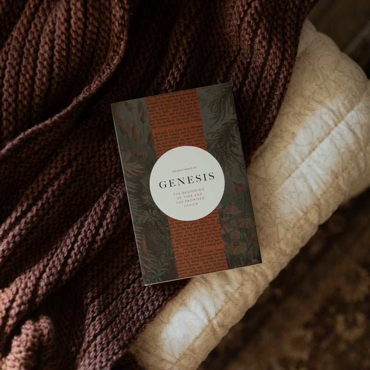 Genesis Hardcover study cover on a woven blanket