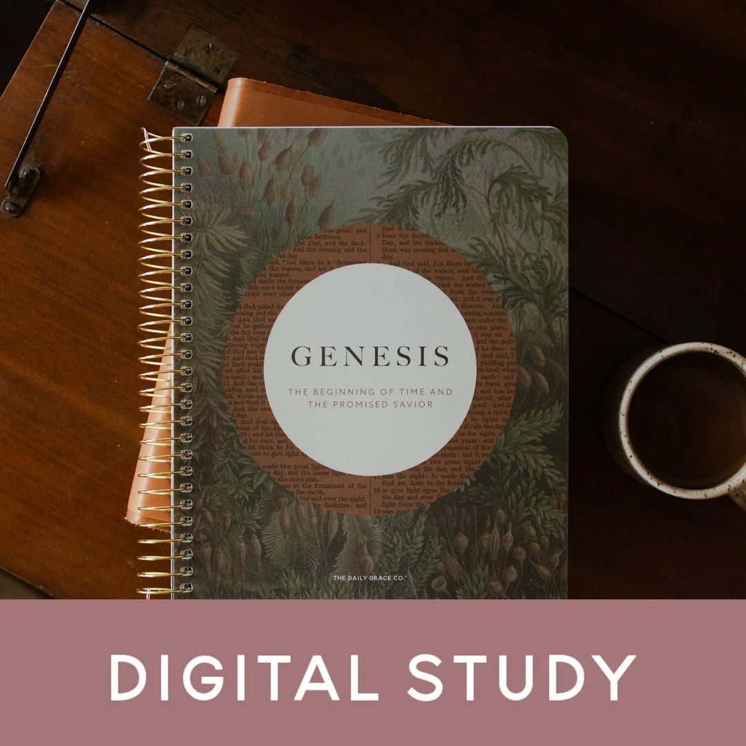 Genesis Spiral on a closed bible on a wooden table near a coffee cup