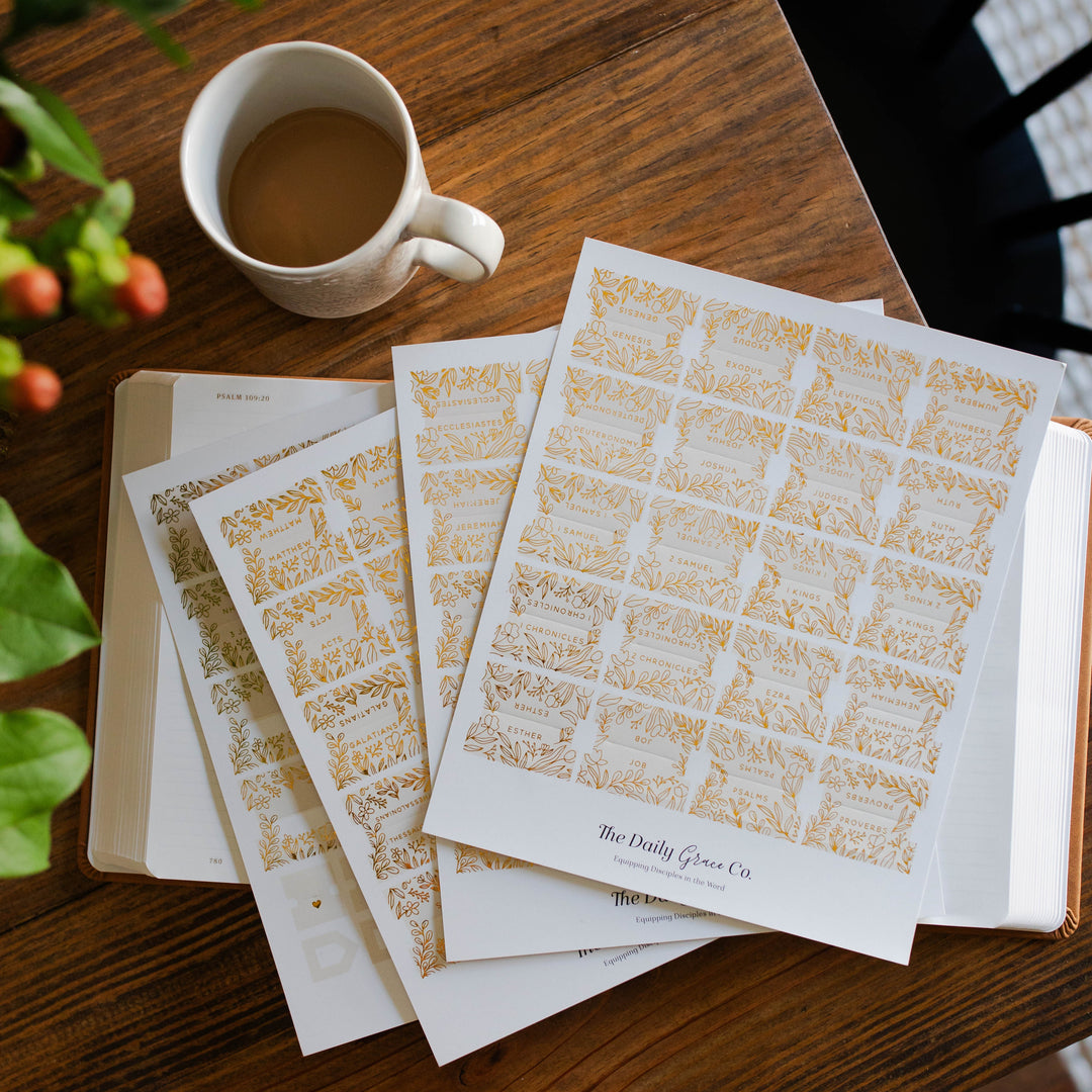 Bible Tabs for women in cream displayed on table on journaling bible