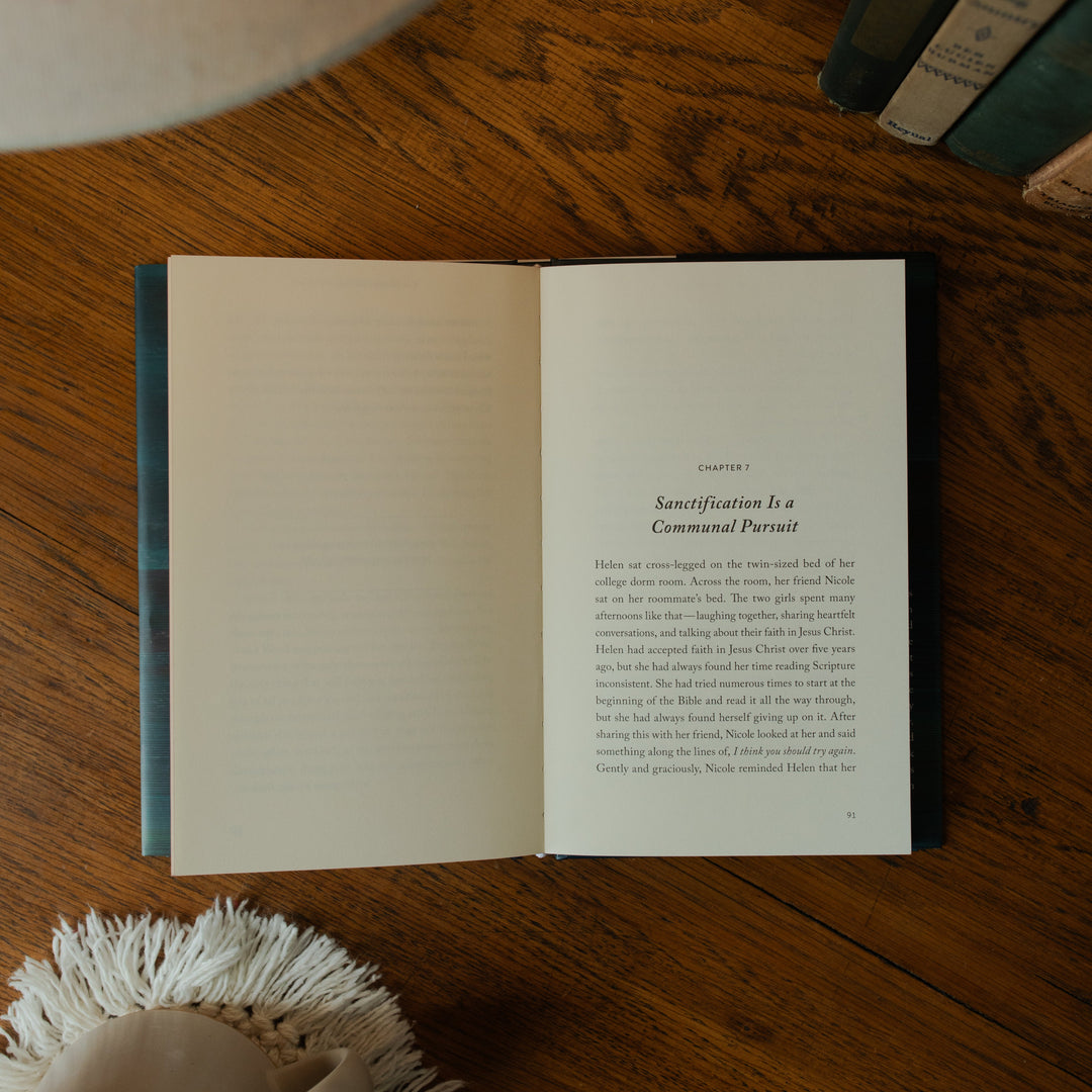 The Good Christian Girl Book opened to chapter 7 on a wooden table