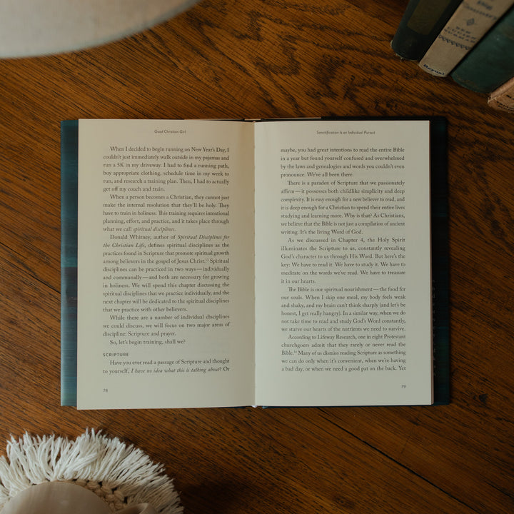 The Good Christian Girl Book opened to page 79 on a wooden table