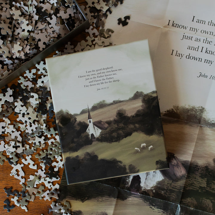 Good Shepherd Puzzle box next to the puzzle poster and on multiple pieces