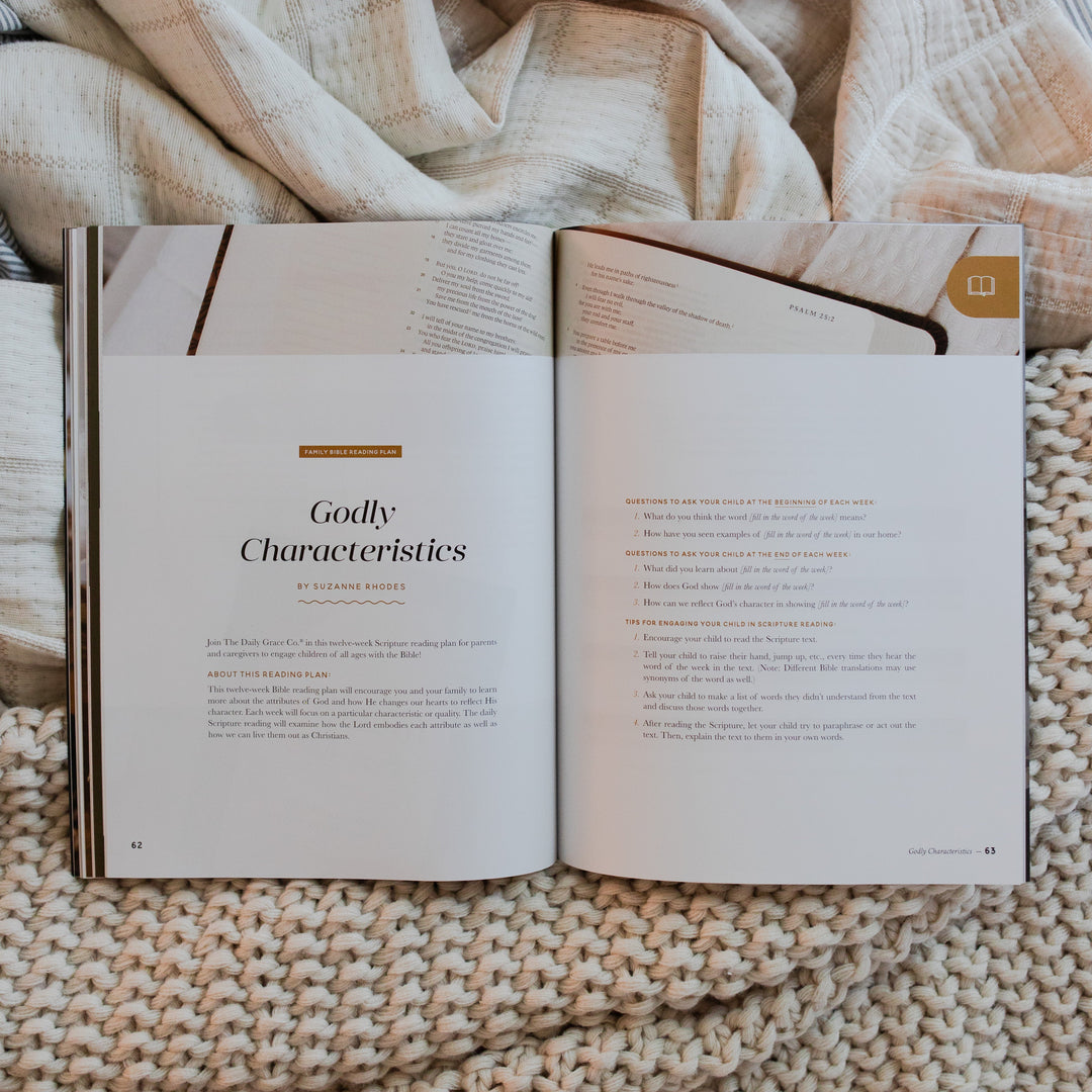 Gospel at Home Issue 9 Magazine opened to Godly Characteristics page on two blankets, one that is knitted and one that is smooth