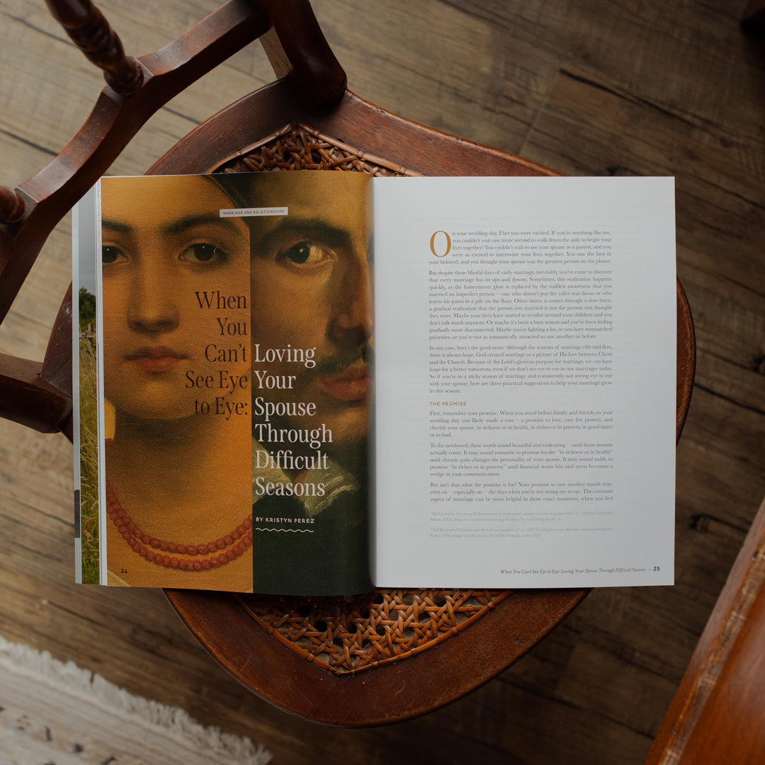 Open book with a portrait on the cover and text on the right page, held by a wooden chair.