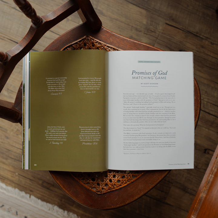 Open book on a wooden chair with text visible
