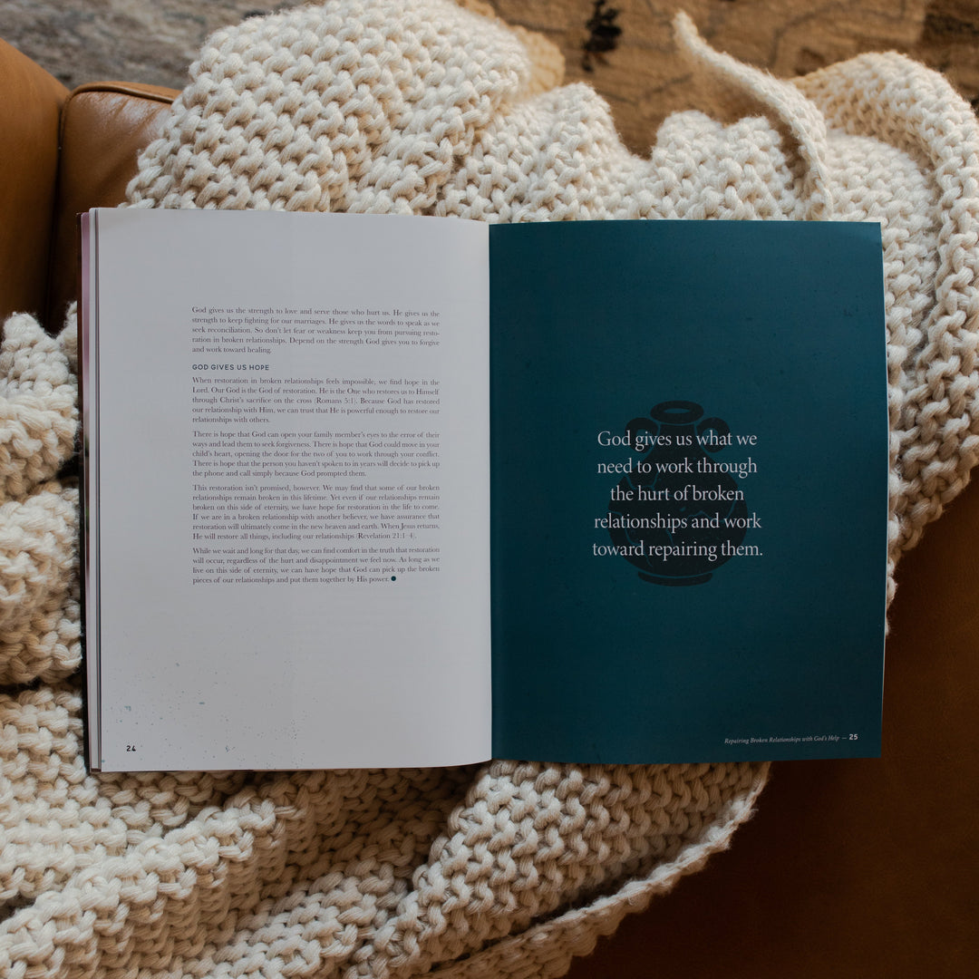 Gospel at Home Issue 11 opened to the repairing broken relationships with God's help page on a white knitted blanket
