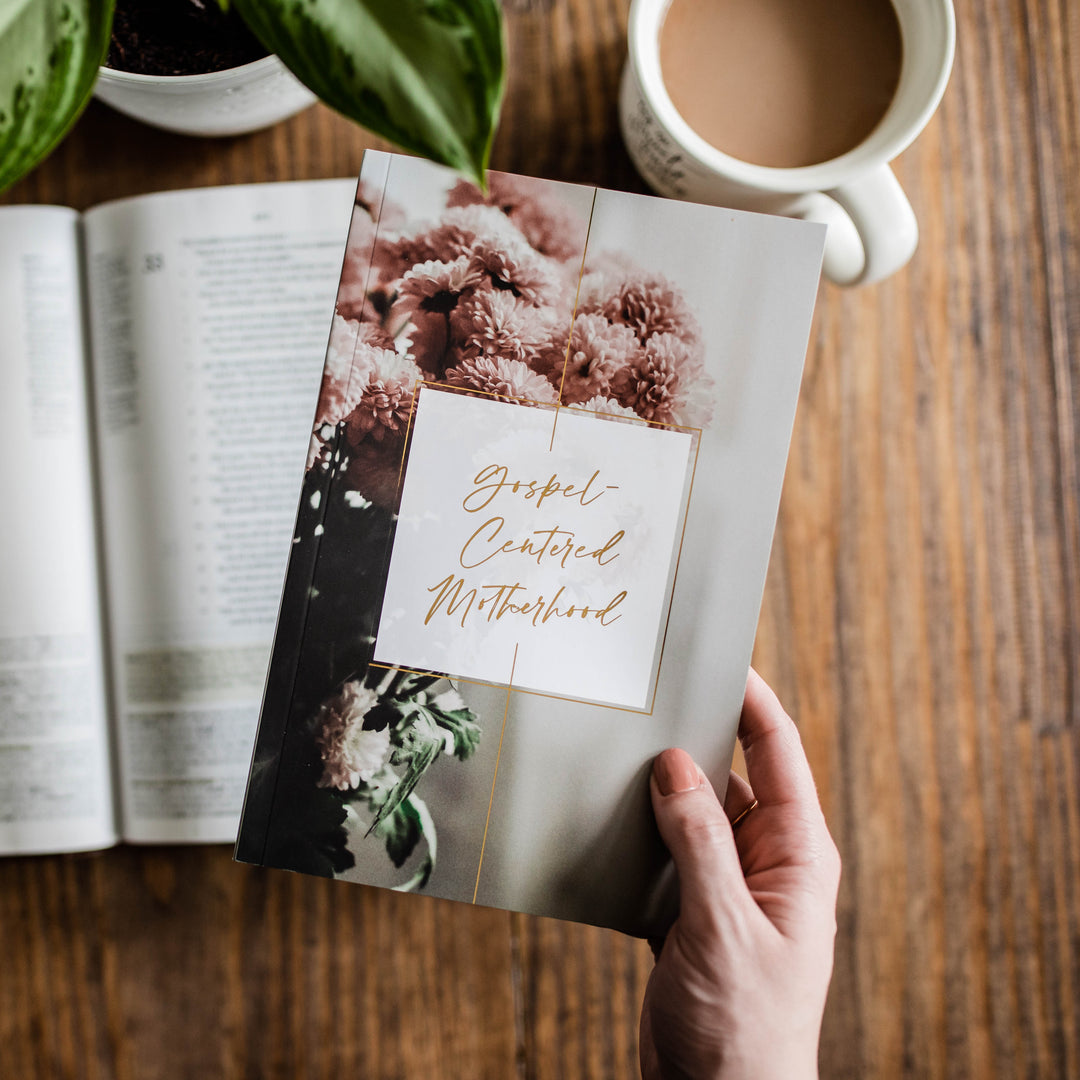 Women holding book for christian moms