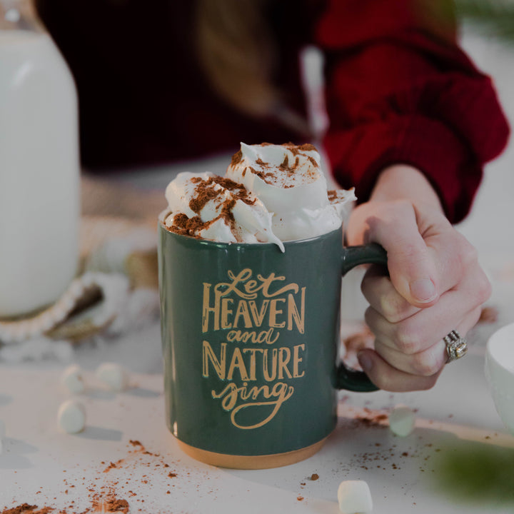 Christmas mug Heaven and Nature Sing with whipped cream and cinnamon on top