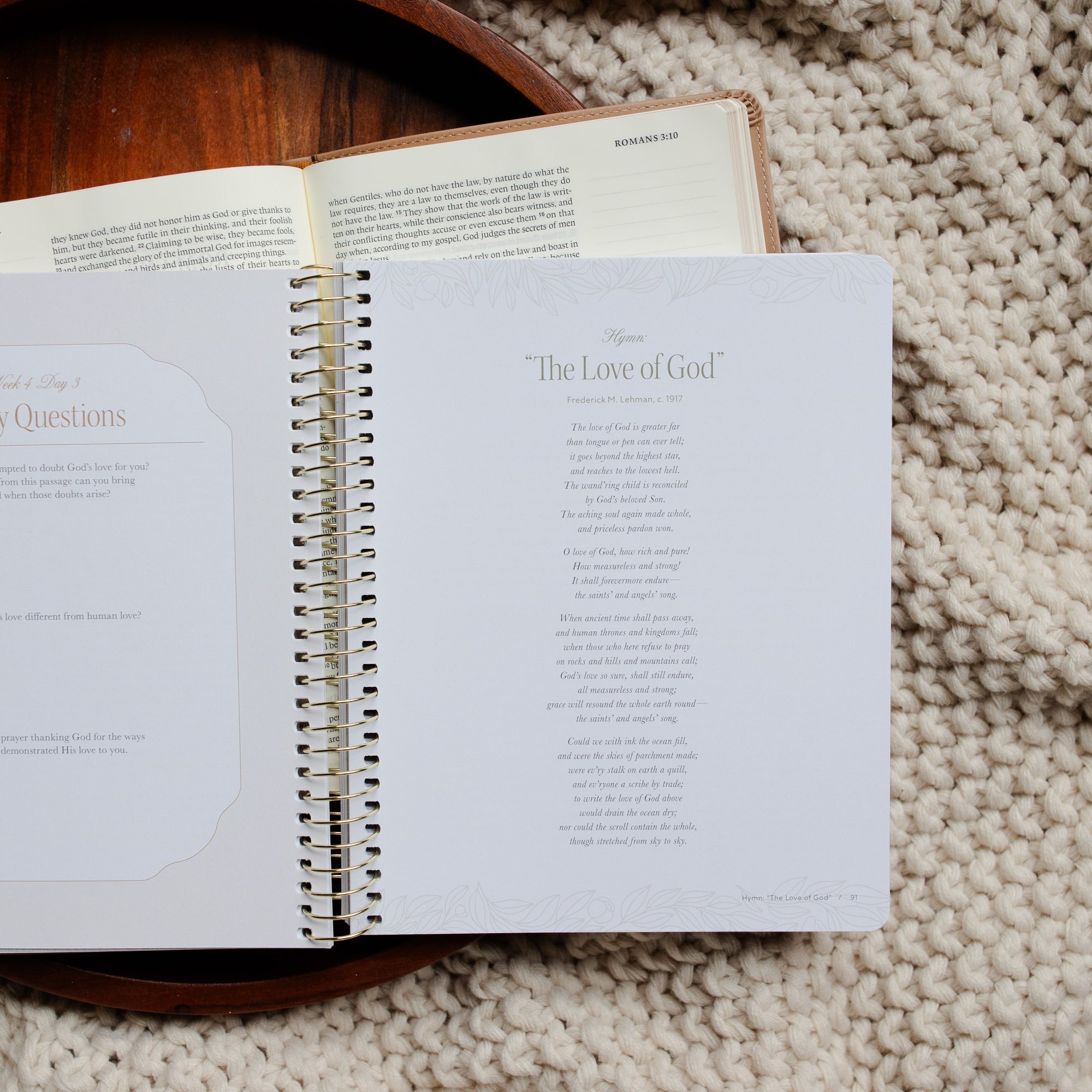 In Christ Alone Study opened to the Week 4 Day 3 Hymn page on an open Bible on a wooden tray on a knitted blanket
