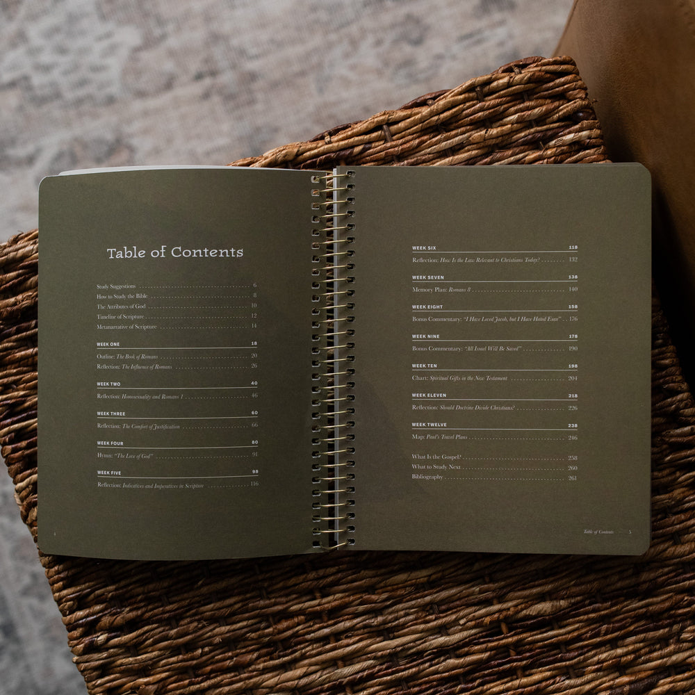 In Christ Alone Mens Study opened to the Table of Contents on an woven box