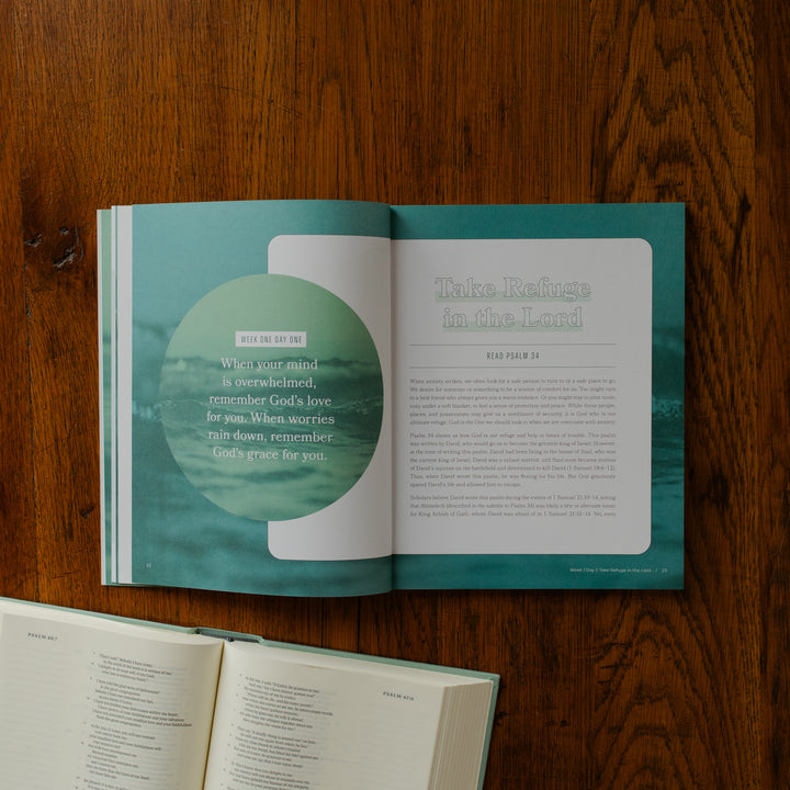 It is Well Teen Study opened to the week 1 day 1 page on a wooden table next to an open bible