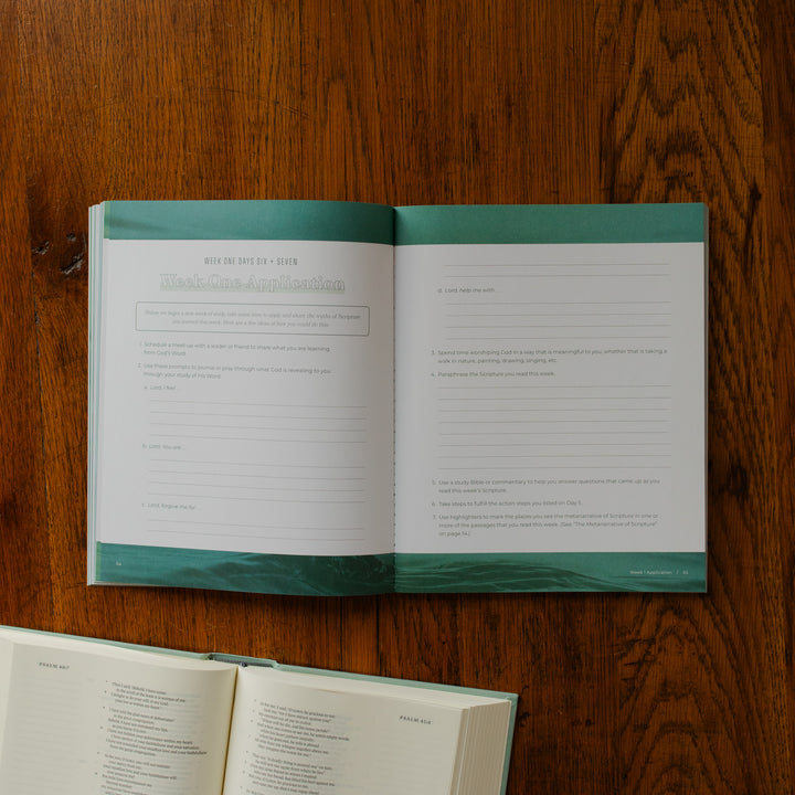 It is Well Teen Study opened to the week one application page on a wooden table next to an open bible