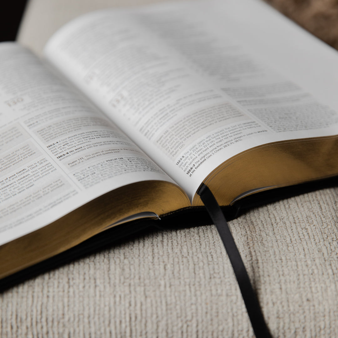 Open bible on a textured surface