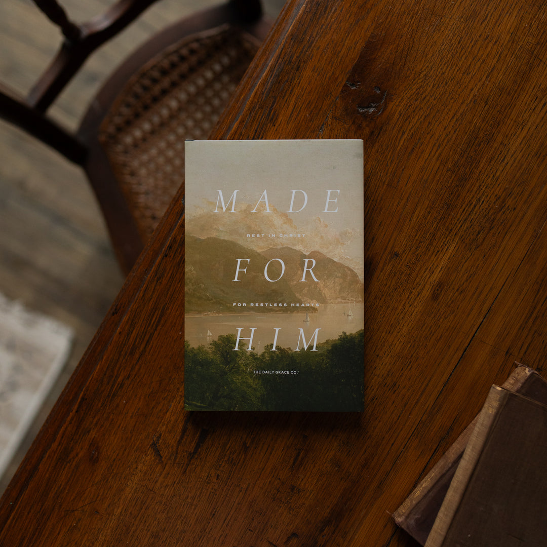 Made for Him book cover on a wooden table near a chair