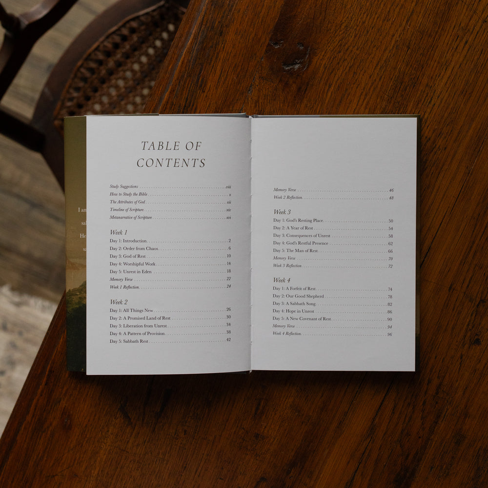 Made for Him book opened to the table of contents page on a wooden table near a chair