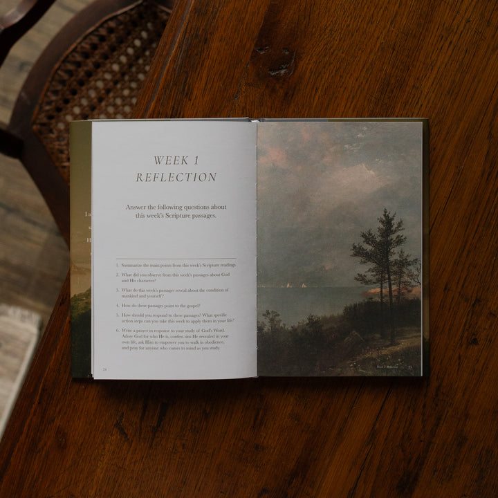 Made for Him book opened to the Week 1 Reflection page on a wooden table near a chair
