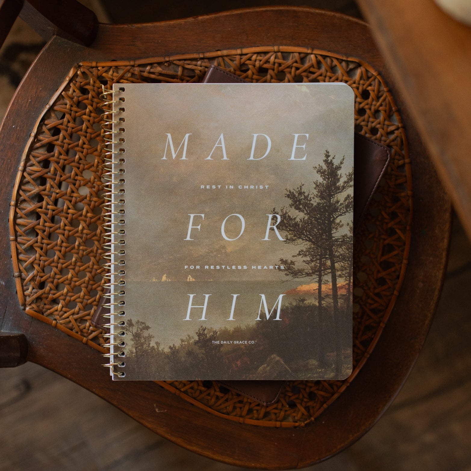Made for Him Spiral study cover on a bible on a wooden chair