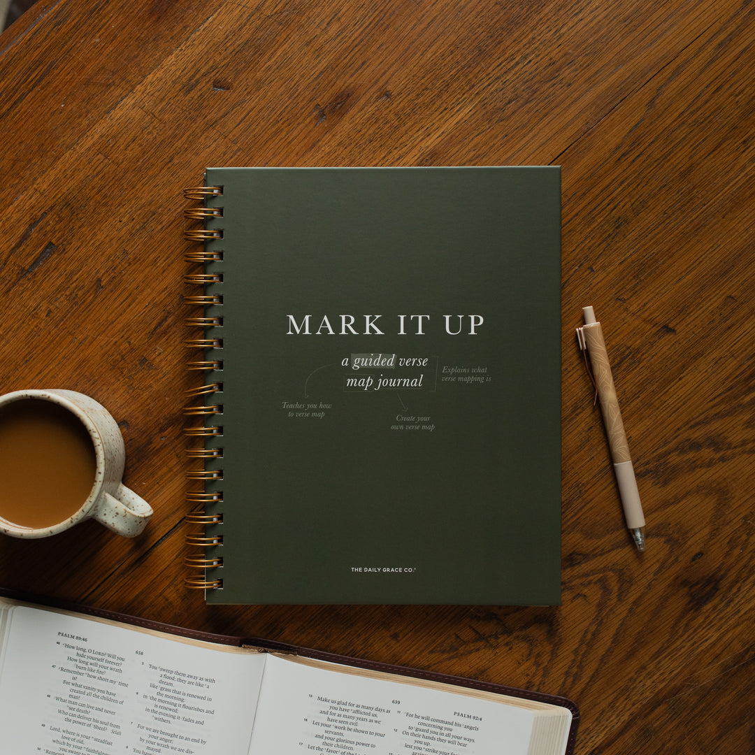 Mark It Up Journal cover next to a pen and a coffee cup