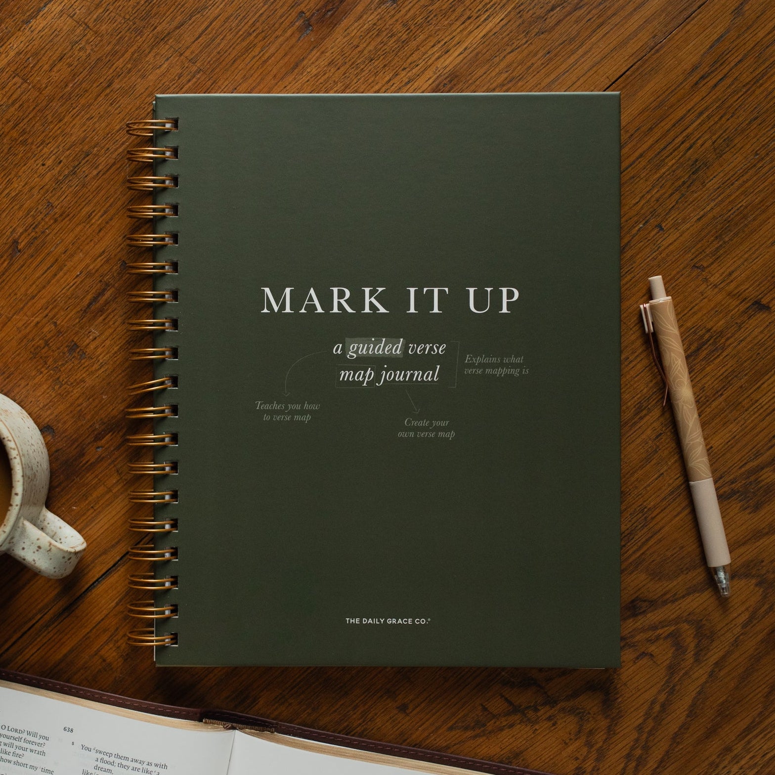 Mark It Up Journal cover next to a pen and a coffee cup