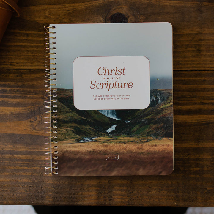 Year long bible study for men on Christ in all of Scripture Volume 2 sitting on table