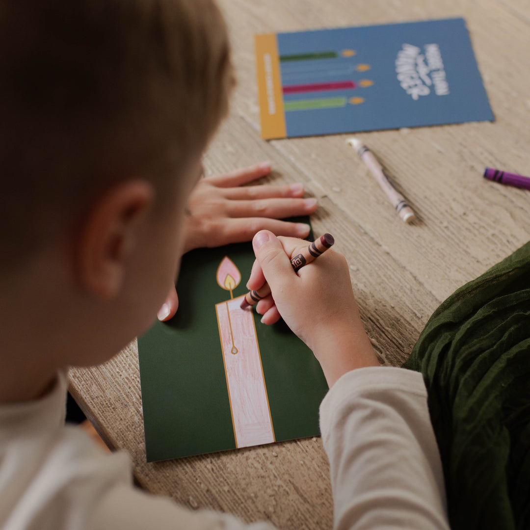 Little boy coloring Christian Advent family candle cards