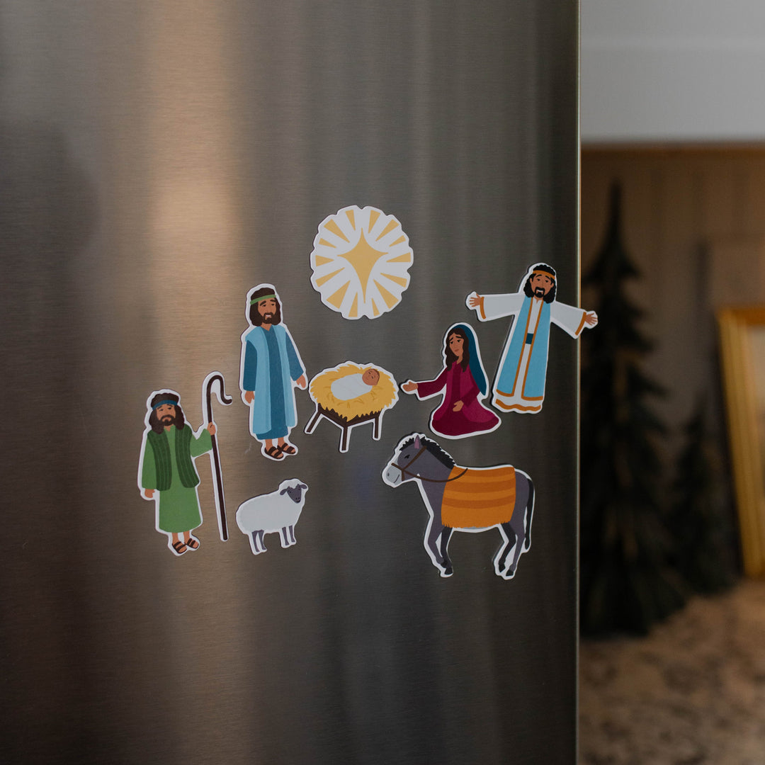 8 Nativity Scene magnets on a refridgerator