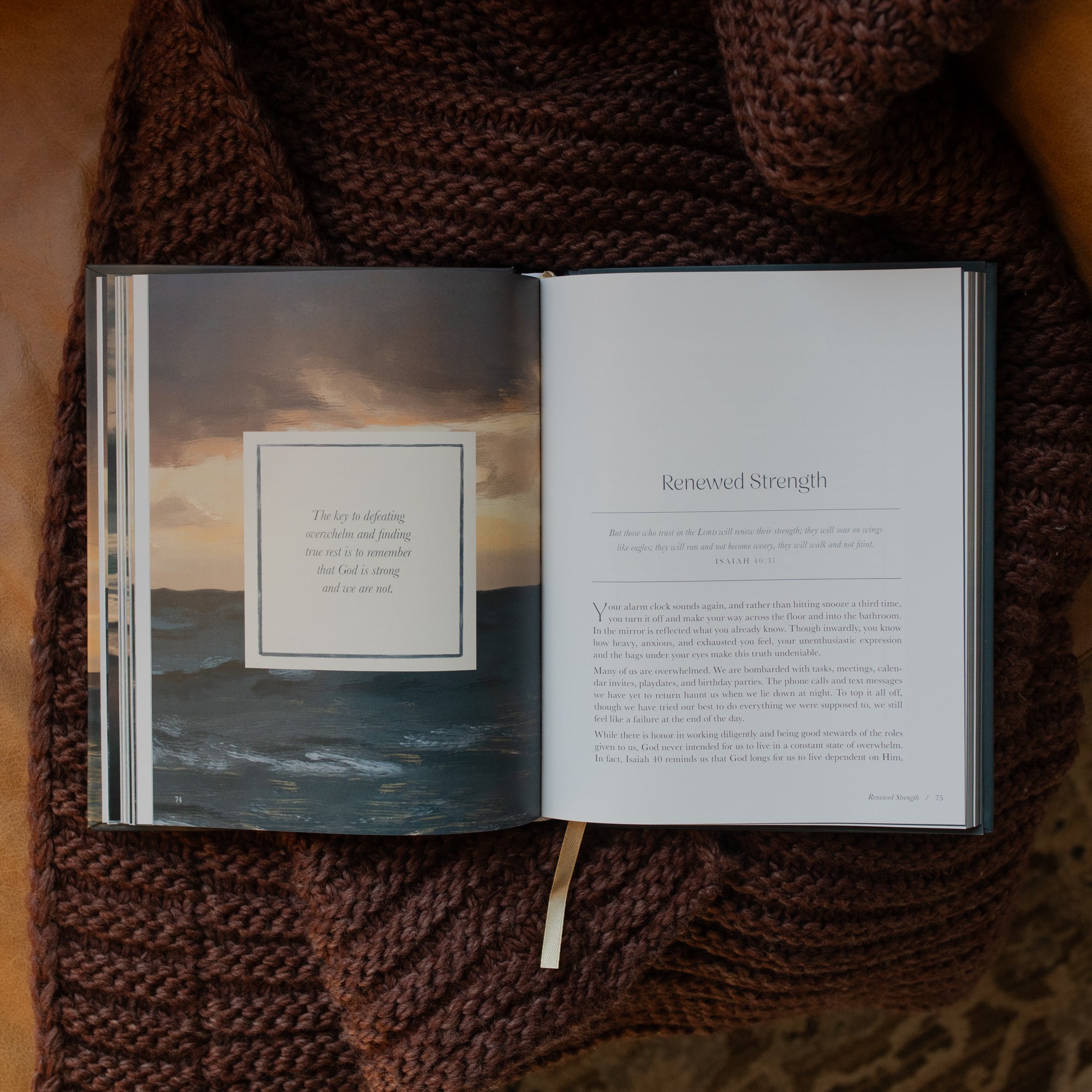 New and Never Ending Mercies opened to the Renewed Strength page on a brown knitted blanket on a leather couch