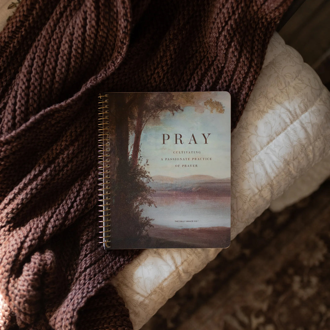 The Pray spiral study cover on a woven blanket 