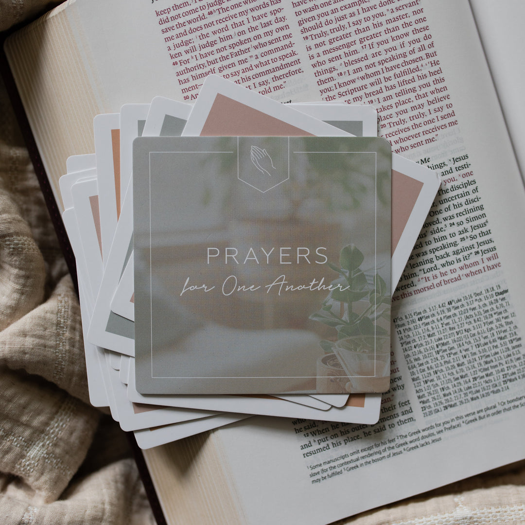 Prayers for One Another with rounded corners on an open bible