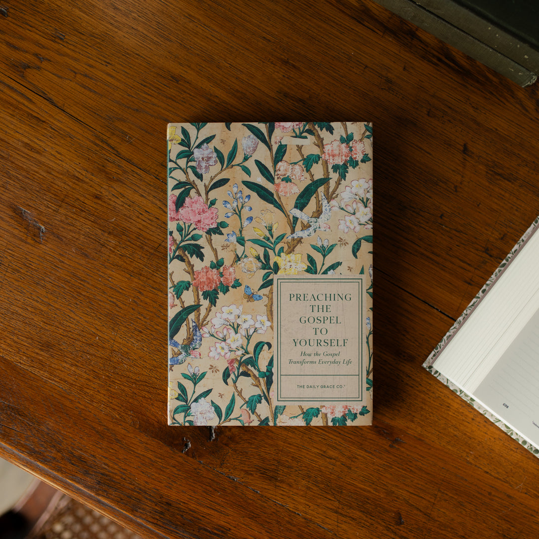 Preaching the Gospel to yourself cover on a wooden table