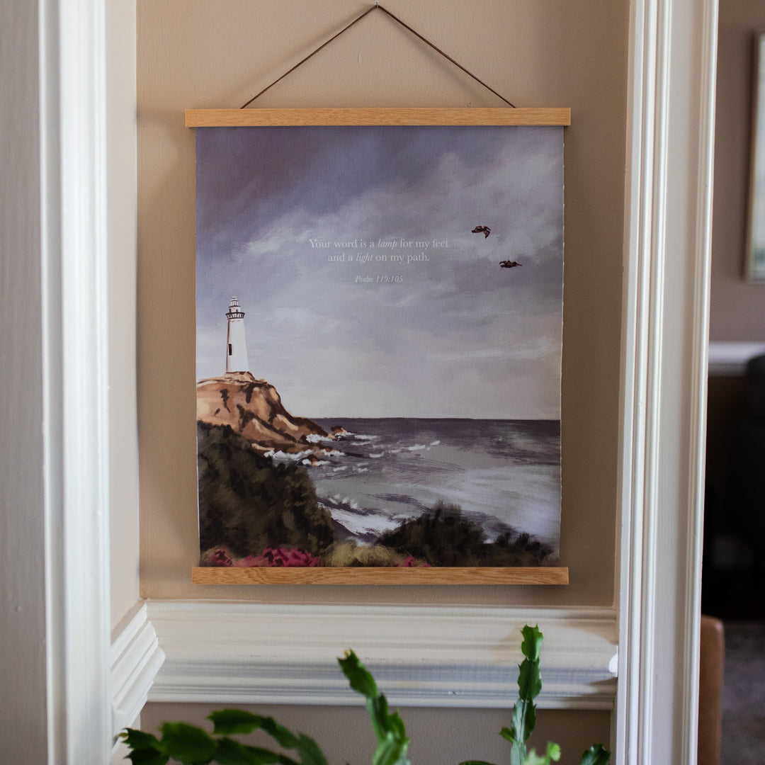 Psalm 119 Lighthouse Painting Print on a light colored wall with white trim