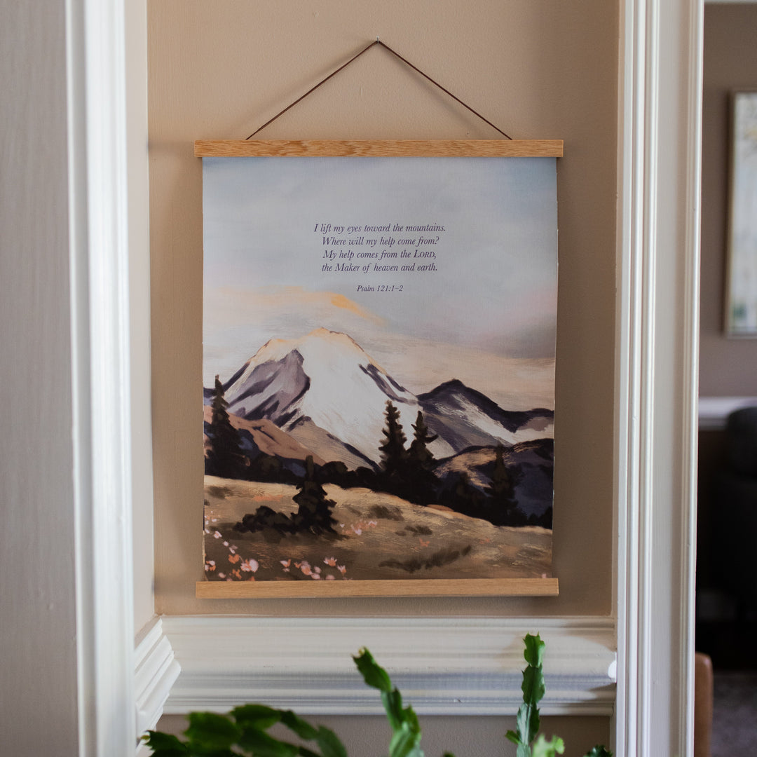 Psalms 121 Mountain Hanging Canvas on a light brown colored wall with white trim