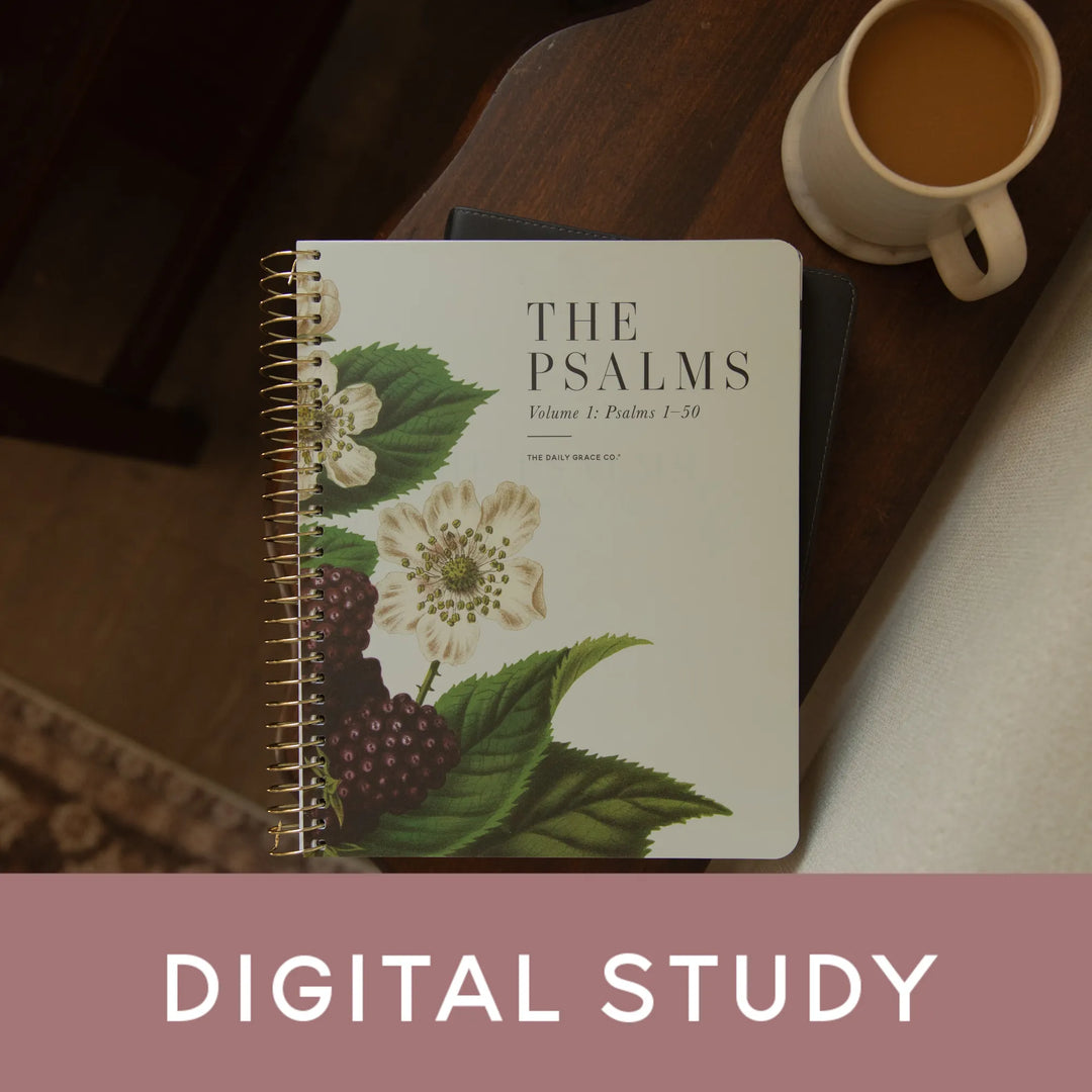 A spiral-bound book titled 'THE PSALMS Volume 1: Psalms 1-50' with a botanical cover design, placed on a wooden table next to a cup of coffee. A pink banner at the bottom reads 'DIGITAL STUDY'.