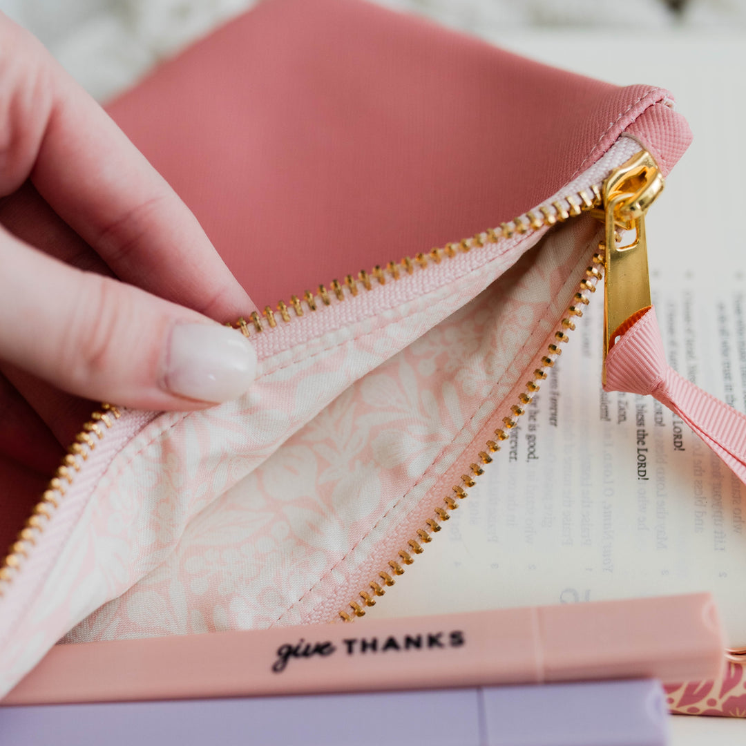 The inside of the renewed Day by Day Pencil Pouch - Blossom Pink. The inside is light pink and floral.