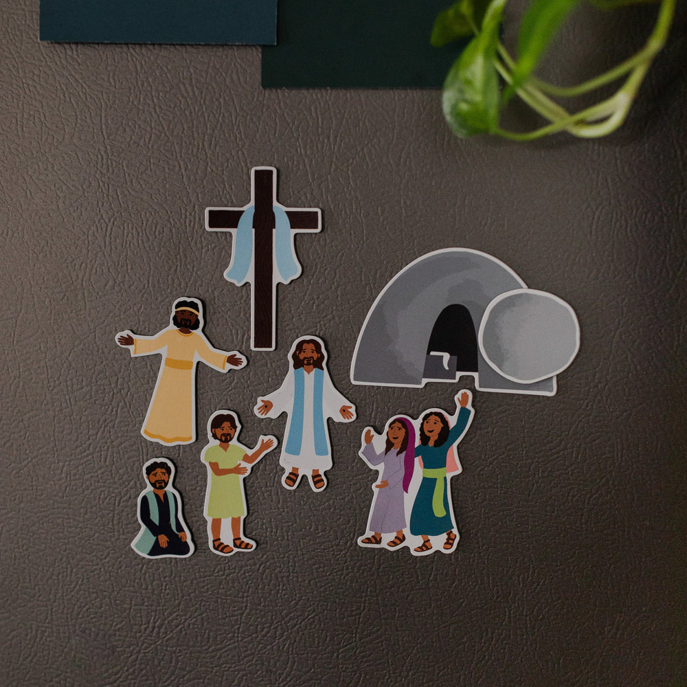 Resurrection Sunday Magnet Set close up on a gray fridge next to some greenery