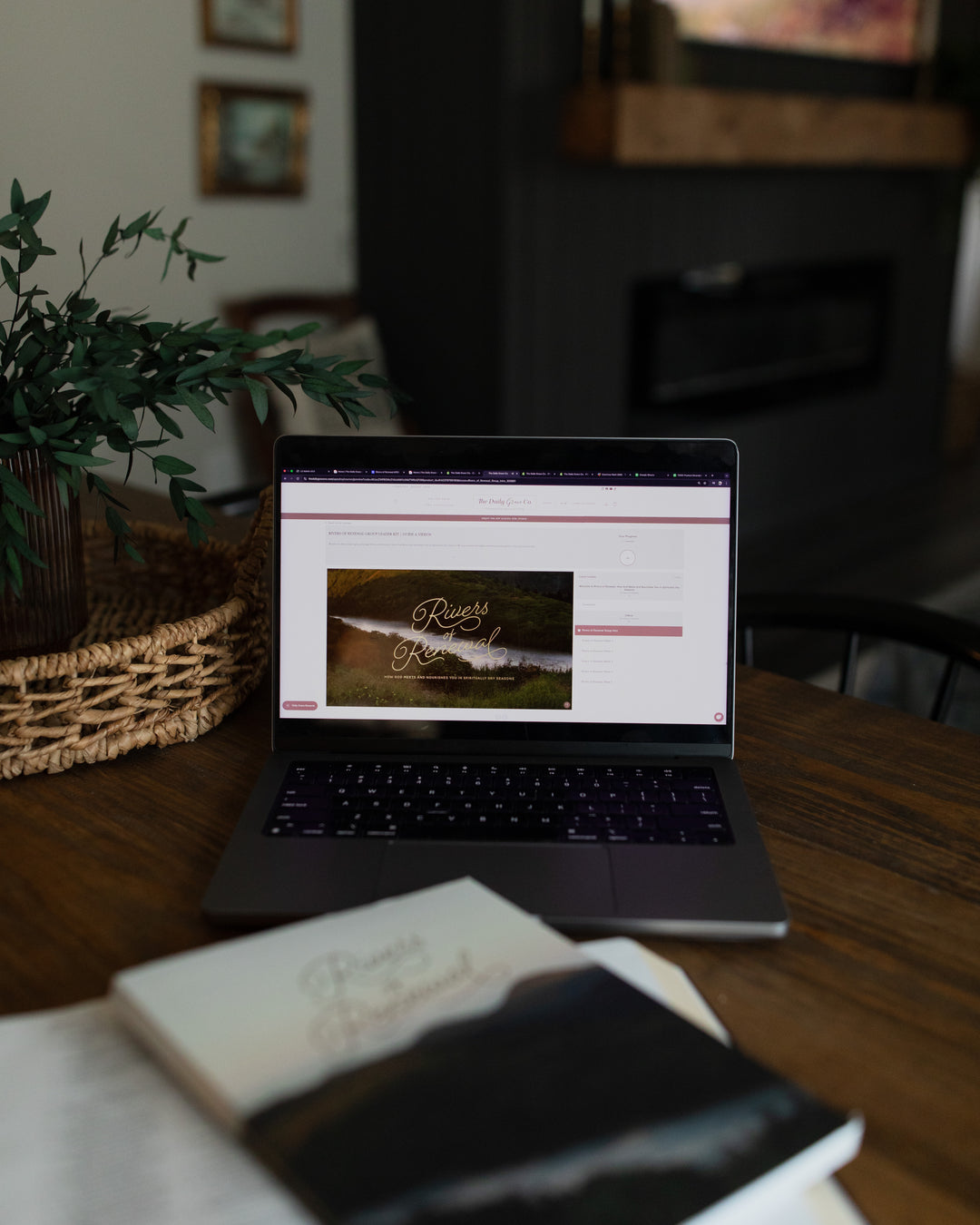 Computer with an image of the Group Leader Guide sitting on a table