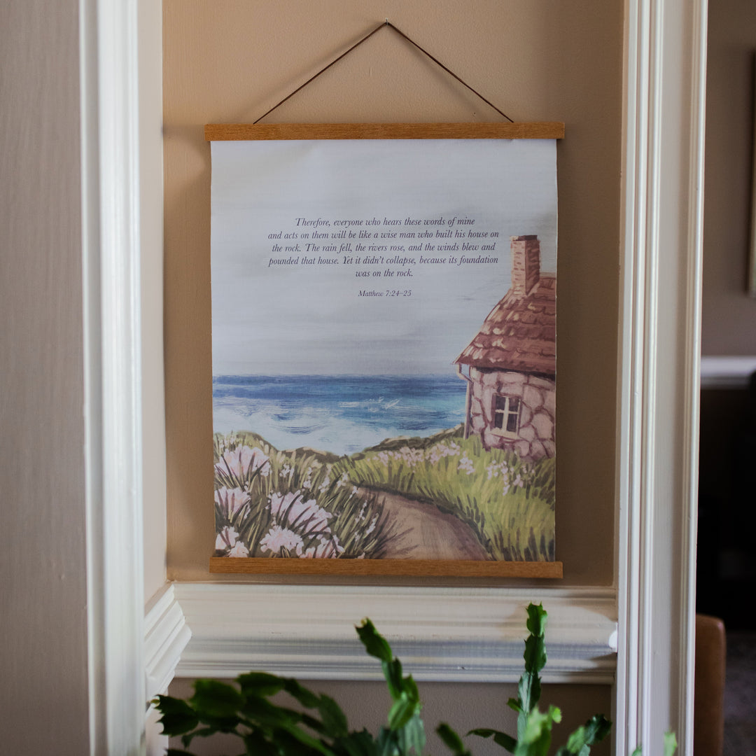 Firm Foundations Hanging Canvas print hanging on a light brown colored wall