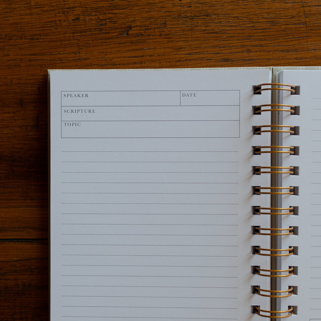 Up close of The Sermon Notes Journal with Pale Stripes on a wooden table