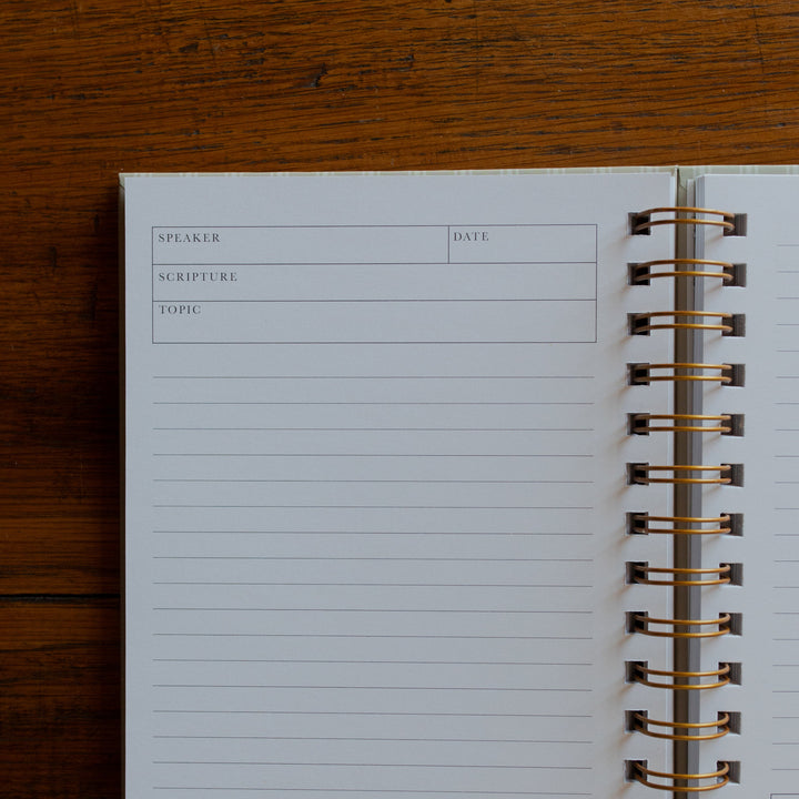 Up close of The Sermon Notes Journal with Pale Stripes on a wooden table