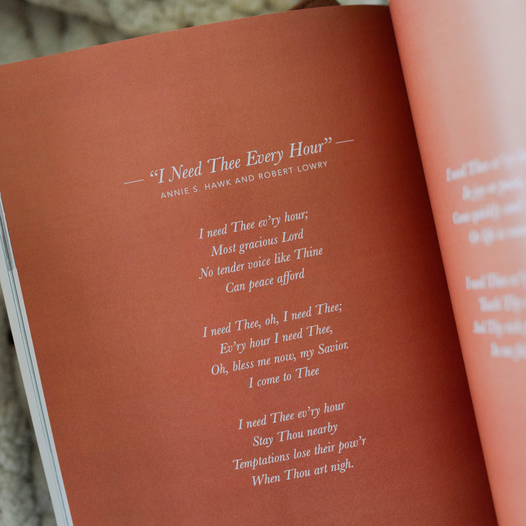 Bible study opened to page with hymn lyrics